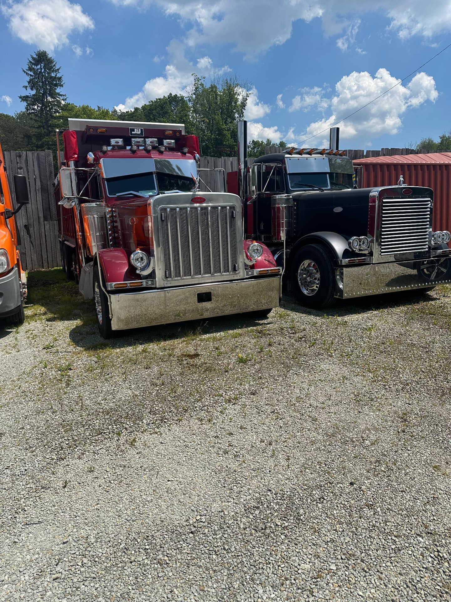 Peterbilt dump trucks parked on the yard